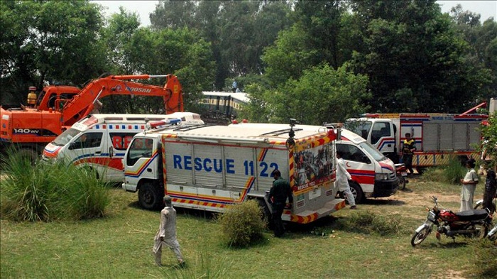 8 killed as train crashes school vehicle in central Pakistan